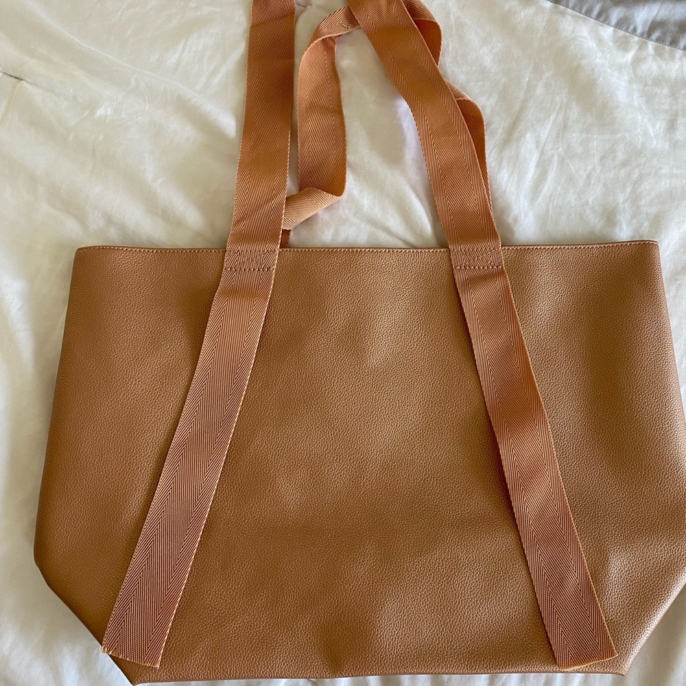 Saks Fifth Avenue Rose Gold Beauty Tote Bag.